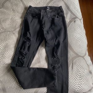 Just black skinny jeans distressed bottom